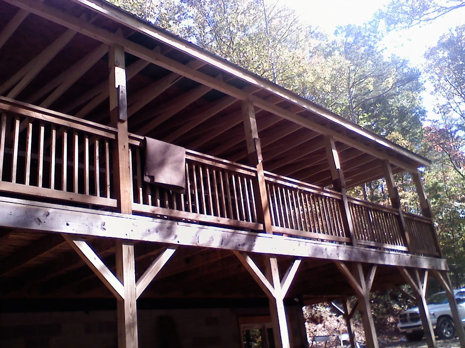 Timber framing under a new elevated porch and deck — Roof Leak Repair in Long Eddy by Roofing Brothers